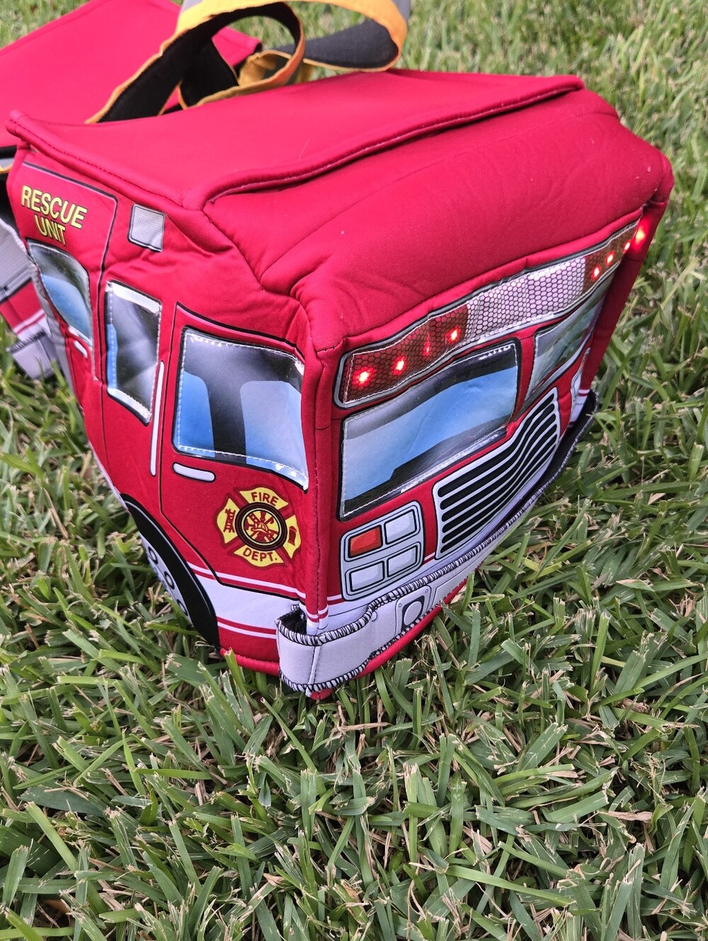 Spirit Halloween Light-Up Firetruck Piggyback Costume Firefighter girl or boy OS